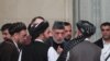 Former Afghan President Hamid Karzai (center) talking to the Taliban officials in Moscow on May 28. 