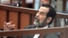 Hussein at his trial earlier this month