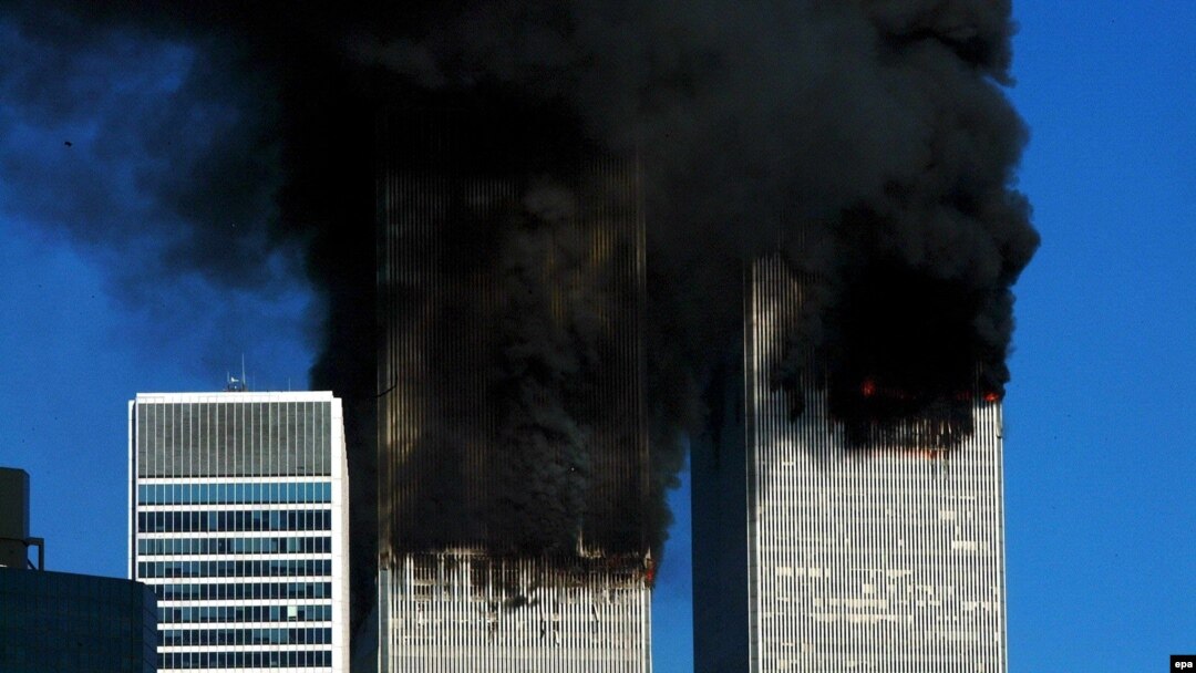 Smoke billows out of the burning World Trade Center towers before their collapse in New York on September 11, 2001.