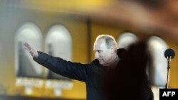 Russia -- Vladimir Putin addresses his supporters during a rally on Manezh Square just outside the Kremlin in Moscow, 04Mar2012