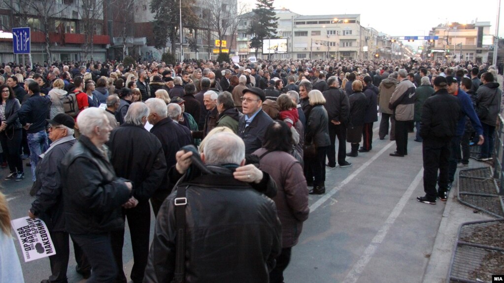 Protesters march in Skopje on February 27.
