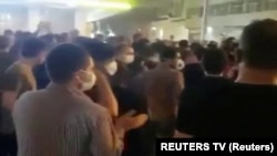 IRAN -- Still image from a video shows people protesting over economic hardship, on the streets of Behbahan, July 16, 2020