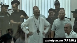 Armenia - Archbishop Bagrat Galstanian and his supporters stand trial in Yerevan, August 21, 2025.