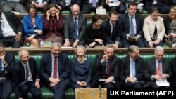 В парламенте Великобритании.