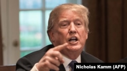 U.S. President Donald Trump speaks during a meeting with senior military leaders at the White House in Washington on April 9.