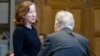 NETHERLANDS -- Jennifer Newstead (left), lawyer of the United Statess, and representative of Iran Mohsen Mohebi talk during the opening of case between Iran and the U.S. at the The International Court of Justice (ICJ) in the Hague, August 27, 2018