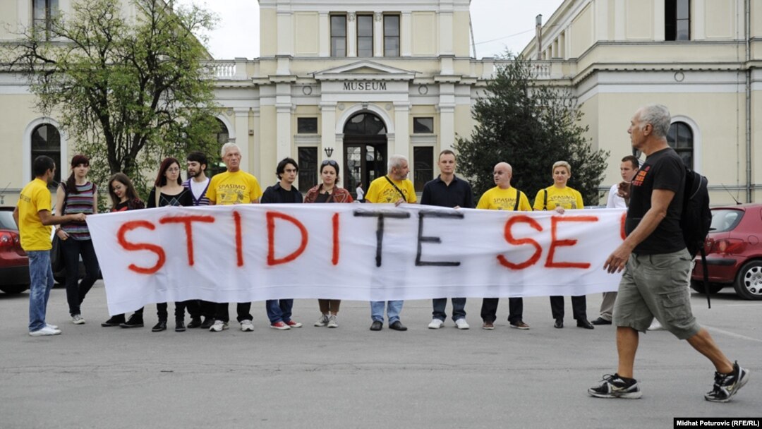 The Anti-Dayton Group protests against the closure of the National Museum, with a banner saying "Shame on you," on October 2.