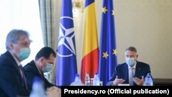 Klaus Iohannis, la o ședință de evaluare a măsurilor privind coronavirusul