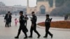 Security personnel patrol near the Id Kah Mosque in Kashgar in China's western Xinjiang region. (file photo)