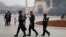Security personnel patrol near the Id Kah Mosque in Kashgar in China's western Xinjiang region. (file photo)
