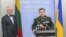 Ukrainian Defense Minister Stepan Poltorak (right) and Lithuanian counterpart Juozas Olekas appear in Kyiv in April.