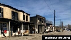 Burnt-down buildings after ethnic clashes in the Masanchi village in the southern Kazakh Zhambyl Province.