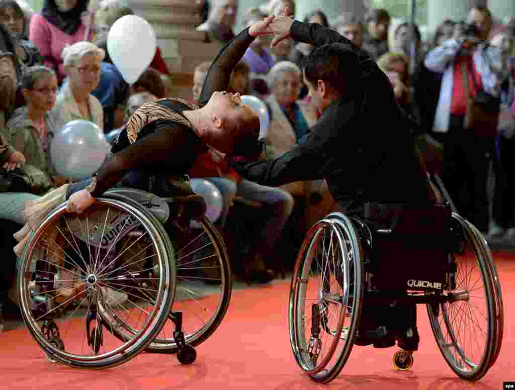 Handicapped dancers perform on the red carpet during the 49th Karlovy Vary International Film Festival, in Karlovy Vary, Xzech Republic, on July 9. (epa/Filip Singer)