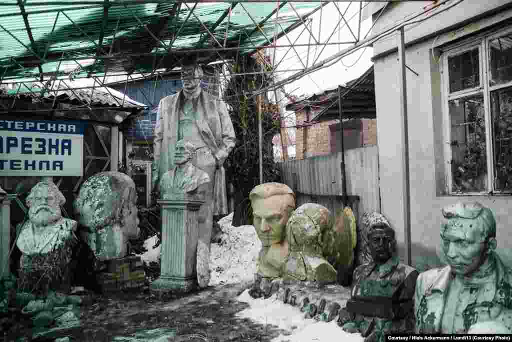 Broken and damaged Soviet-era statues are collected in Kharkiv.