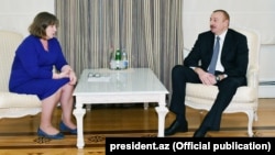 Azerbaijani President Ilham Aliyev (right) received European Parliament rapporteur Norica Nicolai in Baku in April.