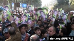 Hundreds demonstrate on February 2 against the killing of a kidnapped child in Afghanistan's Herat Province. 