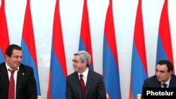 Armenia -- (L-R) Gagik Tsarukian, Serzh Sarkisian and Artur Baghdasarian sign a memorandum of cooperation, Yerevan, 17Feb2011