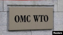 Switzerland -- The World Trade Organization WTO sign is seen at the entrance of the WTO headquarters in Geneva, 09Apr2013