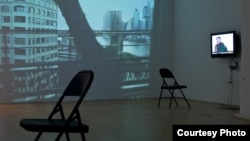 A video installation in the Winkleman Gallery "Brooklyn Bridge" exhibition by Gulnara Kasmalieva and Muratbek Djumaliev in New York City