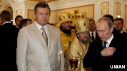 Виктор Янукович, митрополит Симферопольський и Крымский УПЦ (МП) Лазарь (Швец) и Владимир Путин. Севастополь, 2013 год
