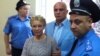 The trial of Yulia Tymoshenko (centre) has been widely criticized in the EU. 