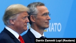 U.S. President Donald Trump (right) and NATO Secretary-General Jens Stoltenberg (file photo)