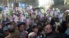 Hundreds demonstrate on February 2 against the killing of a kidnapped child in Afghanistan's Herat Province. 