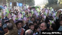 Hundreds demonstrate on February 2 against the killing of a kidnapped child in Afghanistan's Herat Province.