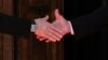 Russian President Vladimir Putin (left) shakes hands with U.S. President Joe Biden during their meeting in Geneva on June 16.