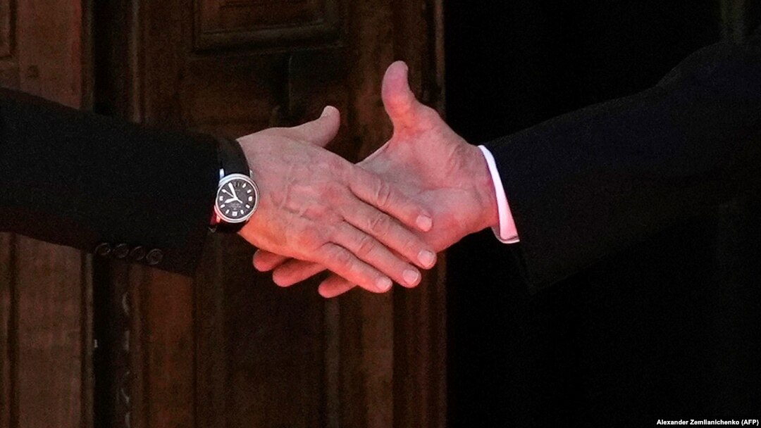 Russian President Vladimir Putin (left) shakes hands with U.S. President Joe Biden during their meeting in Geneva on June 16.