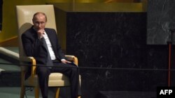 Russian President Vladimir Putin waits to address the 70th Session of the UN General Assembly at the UN in New York in September 2015.