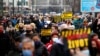 BOSNIA-HERZEGOVINA -- People display signs during a protest urging the government to obtain coronavirus disease (COVID-19) vaccines, in Sarajevo, April 6, 2021