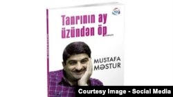 Mustafa Məsturun "Tanrının ay üzündən öp" romanının üz qabığı.
