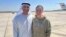 Ksenia Karelina (right) poses for a photo with UAE Ambassador to the US Yousef al-Otaiba following her release at an airport in Abu Dhabi on April 10. 