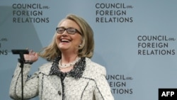 U.S. Secretary of State Hillary Clinton laughs before delivering her final speech as secretary at the Council on Foreign Relations in Washington, D.C., on January 31, 2013.