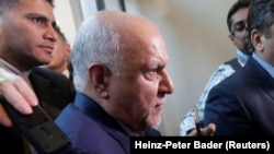 Iranian Oil Minister Bijan Zanganeh arrives at his hotel ahead of a meeting of OPEC oil ministers in Vienna on June 19.