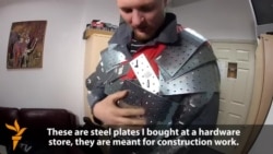 RFE/RL Ukrainian Journalist Demonstrates Homemade Body Armor