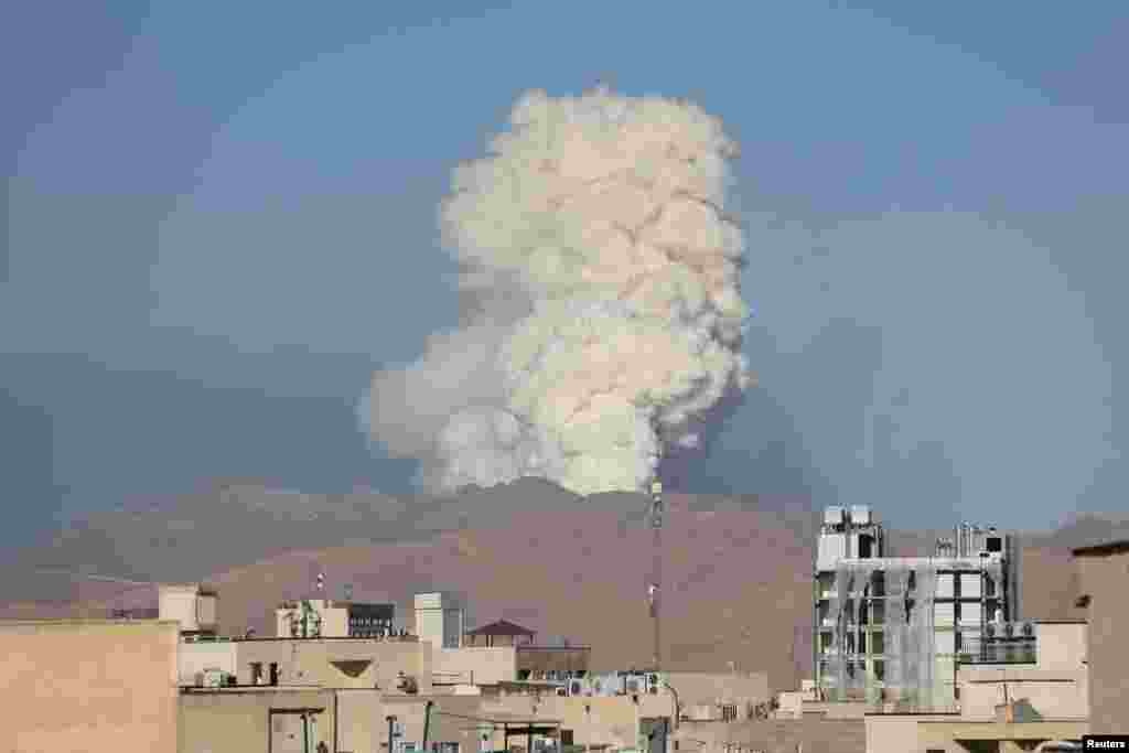Smoke rises following an Israeli strike on Tehran.