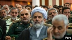 IRGC intelligence chief Hossein Taeb (C) with Qassem Soleimani (R), October 3, 2019