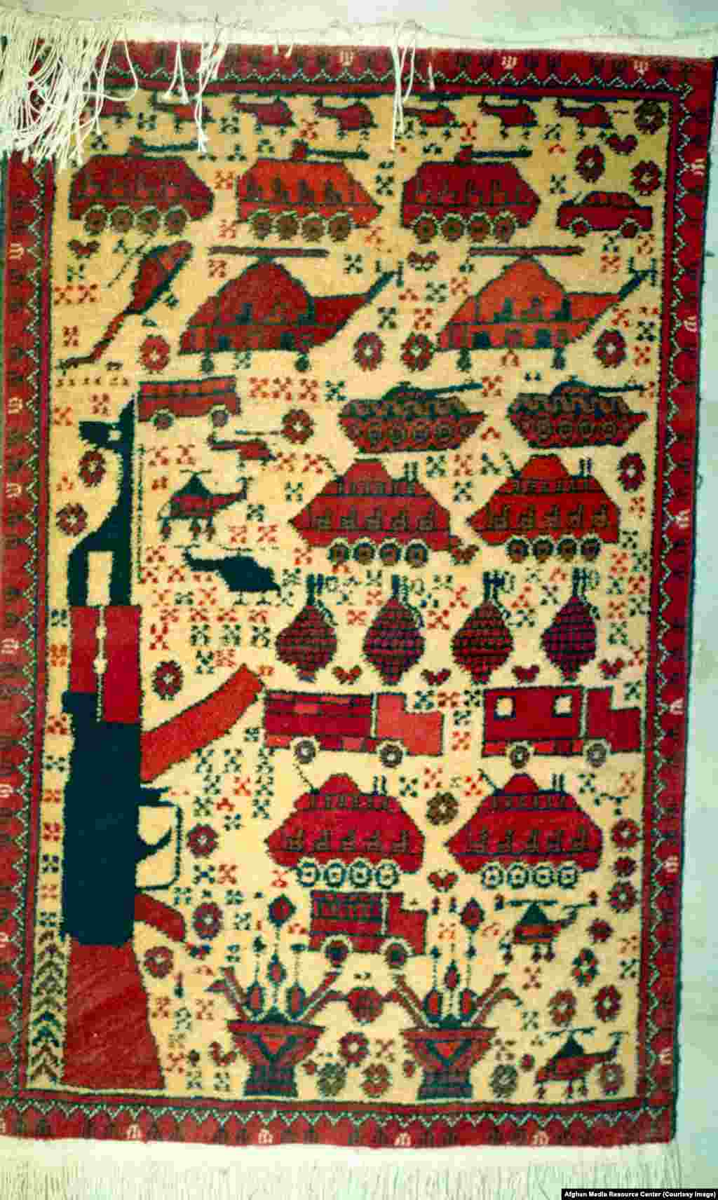 Soviet weaponry depicted on a carpet woven by Afghan refugees.