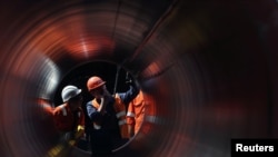 Workers at the construction site of the Nord Stream 2 gas pipeline near Kingisepp, in Russia's Leningrad region.