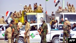 متطوعون في قوات الحشد الشعبي ببغداد