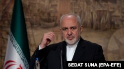 Iranian Foreign Minister Mohammad Javad Zarif speaks during a press conference with Turkish Foreign Minister Mevlut Cavusoglu and his Azeri counterpart Elmar Mammadyarov (both not pictured) in Istanbul, Turkey, 30 October 2018.