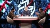 IRIB's controversial commentators Mohammad Sadegh Koushki (R) and Nader Talebzadeh (C), in a Jahanara program, produced by IRIB's Ofogh TV.
