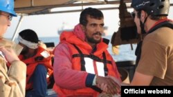 A U.S. Defense Department photo of an Iranian sailor from the "Ya Hussayn," which the U.S. said was assisted in the northern Persian Gulf by the U.S. Fifth Fleet's cutter "Monomoy" on January 10 after a distress call.