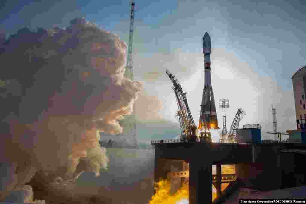 A Soyuz spacecraft carrying the Canopus satellite blasts off from the launchpad at the Vostochny Cosmodrome in Russia on December 27. (Roskosmos via Reuters)