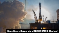 A Soyuz spacecraft with a Canopus satellite blasts off from a launchpad at the Vostochny Cosmodrome in December 2018.