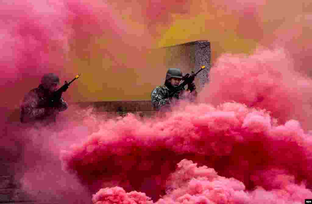 Macedonian security forces perform an exercise after finishing three weeks of training with U.S. Navy Seals in Skopje on February 13. (epa/Georgi Licovski)