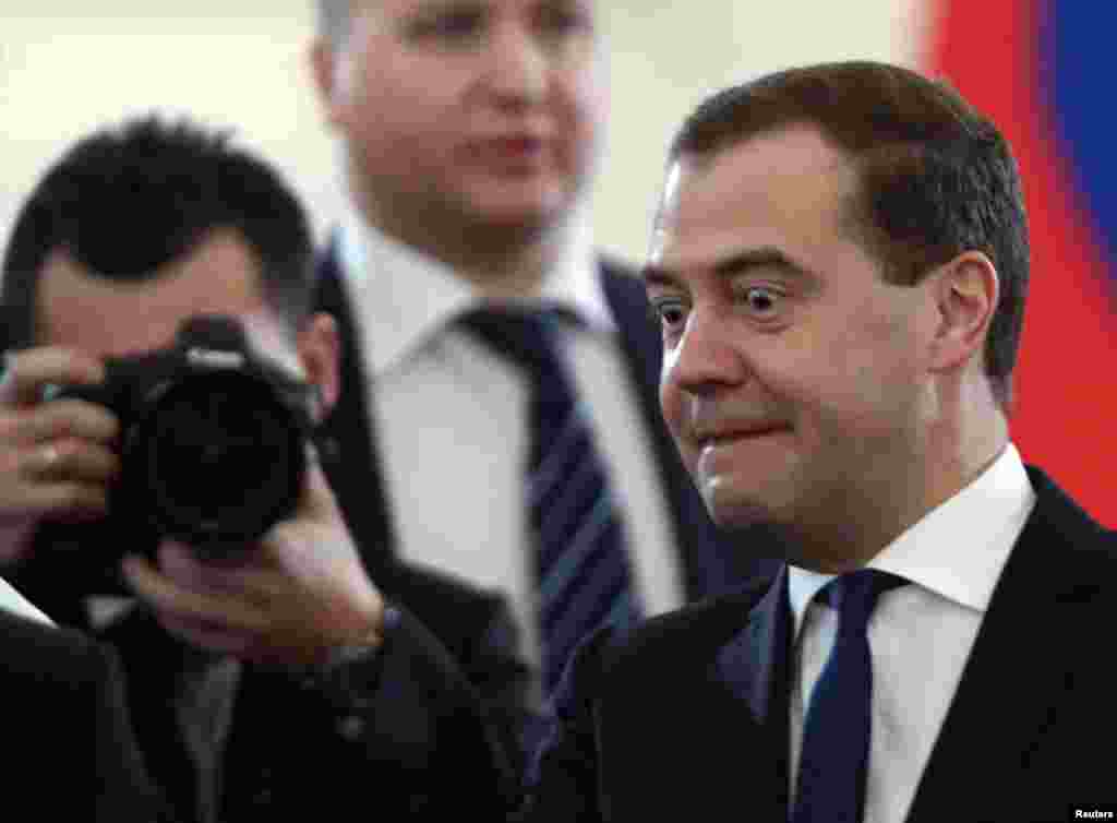 Russian Prime Minister Dmitry Medvedev reacts during a visit to the Kremlin to listen to President Vladimir Putin's annual state of the nation address in Moscow. (Reuters/Sergei Karpukhin)