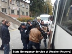 Emergency workers are now evacuating people in the area surrounding the ammunition depot in northeastern Ukraine.